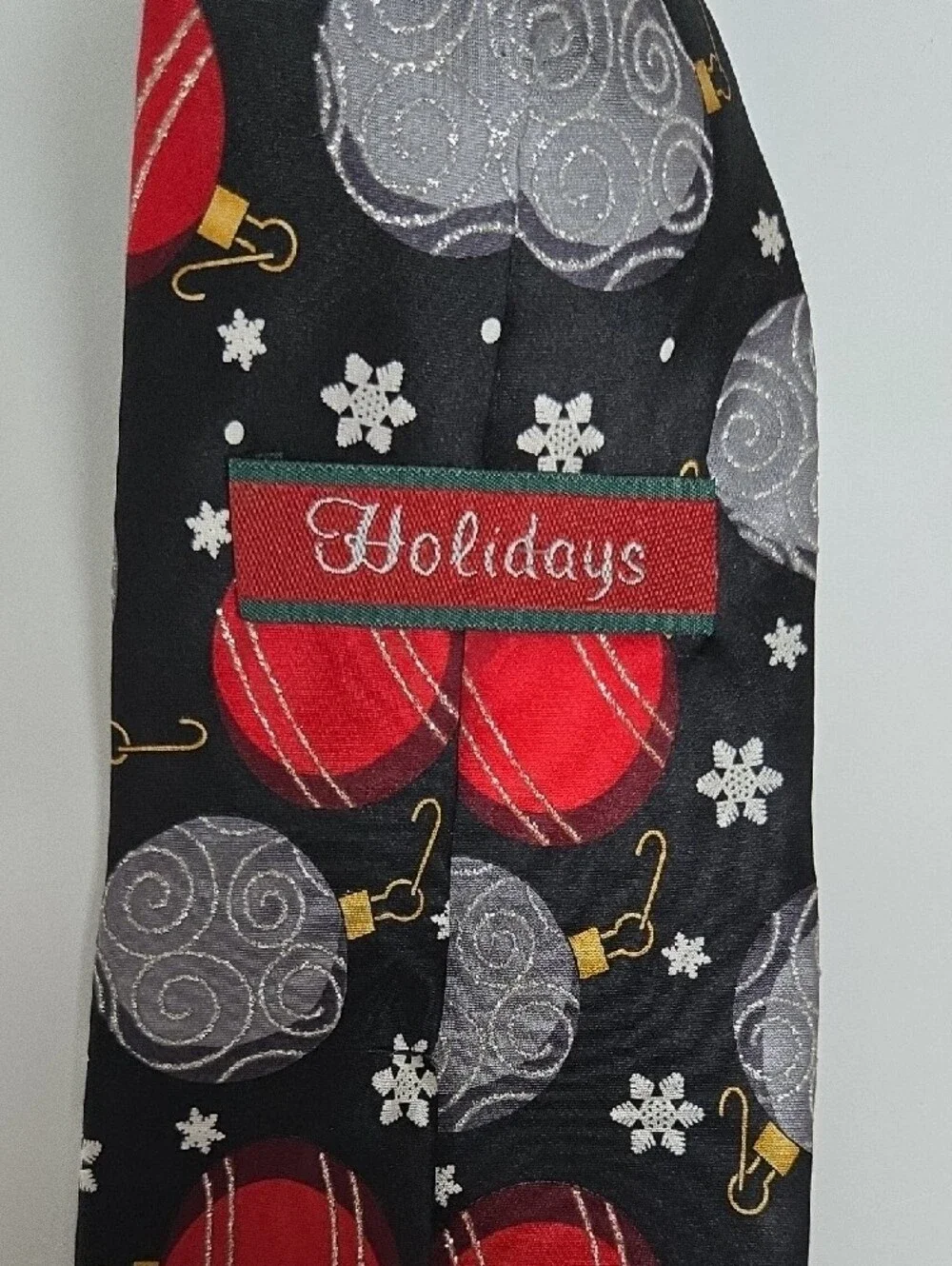 Black Holiday Tie with Red and Silver Ornament Motif